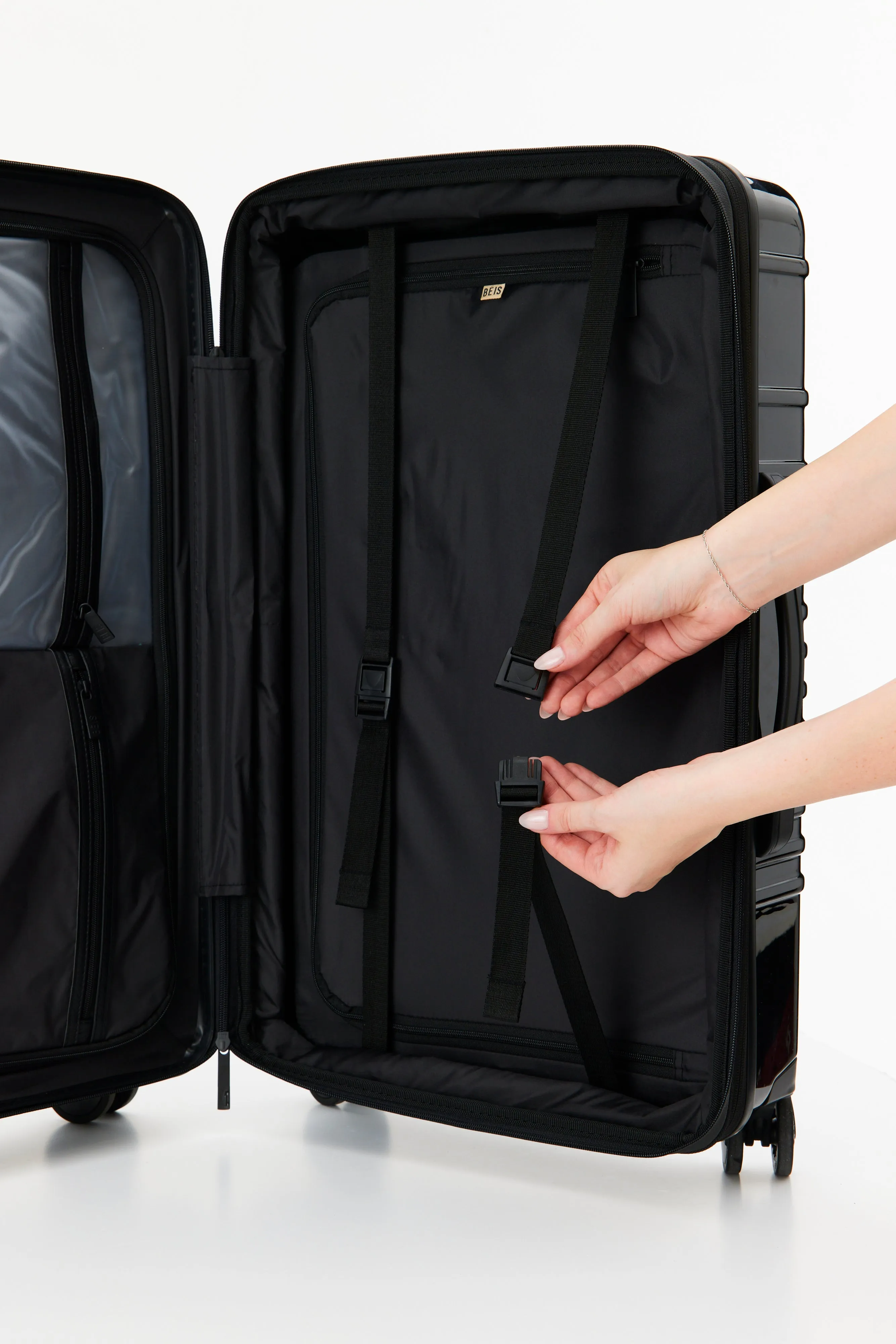 The Large Check-In Roller in Glossy Black