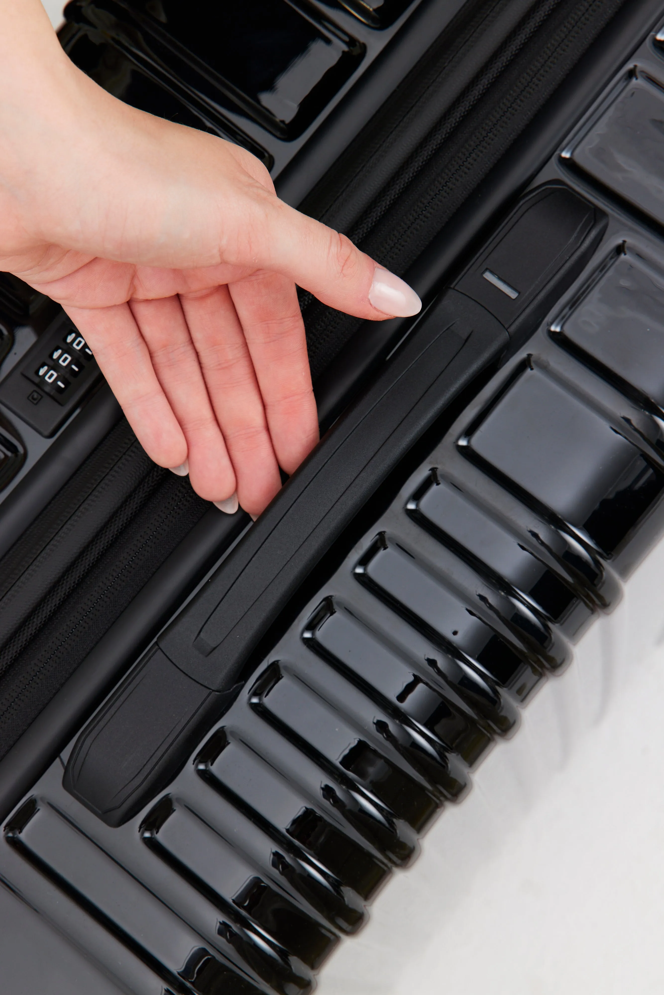 The Large Check-In Roller in Glossy Black